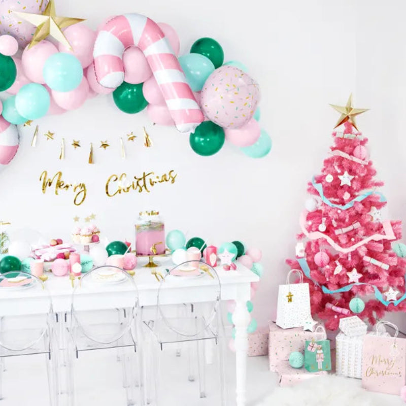 Globo de bastón de caramelo con rayas rosas y detalles dorados para decoración festiva.