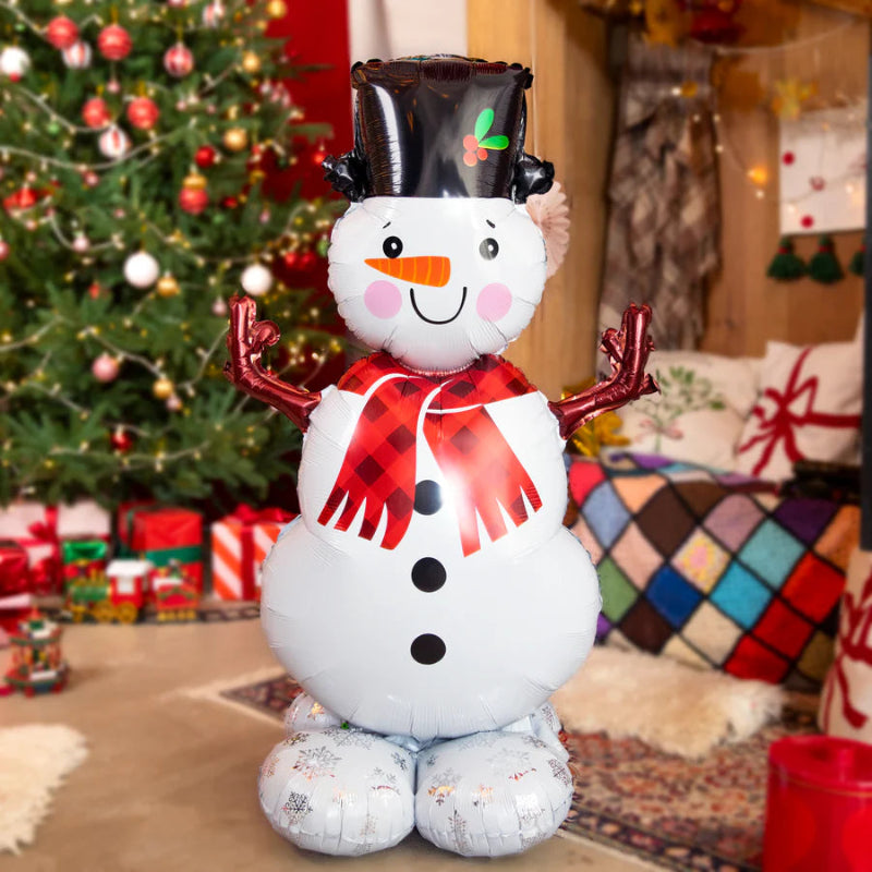 Decoración divertida para fiestas de Navidad con un globo DIY de muñeco de nieve.