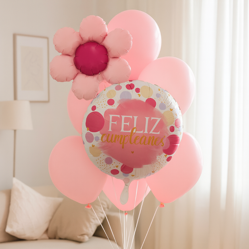 Detalle de los puntos rosas y el texto "Feliz Cumpleaños" en el globo para helio.