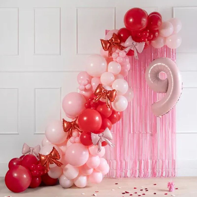 Globo en forma de lazo rosa pastel para guirnalda